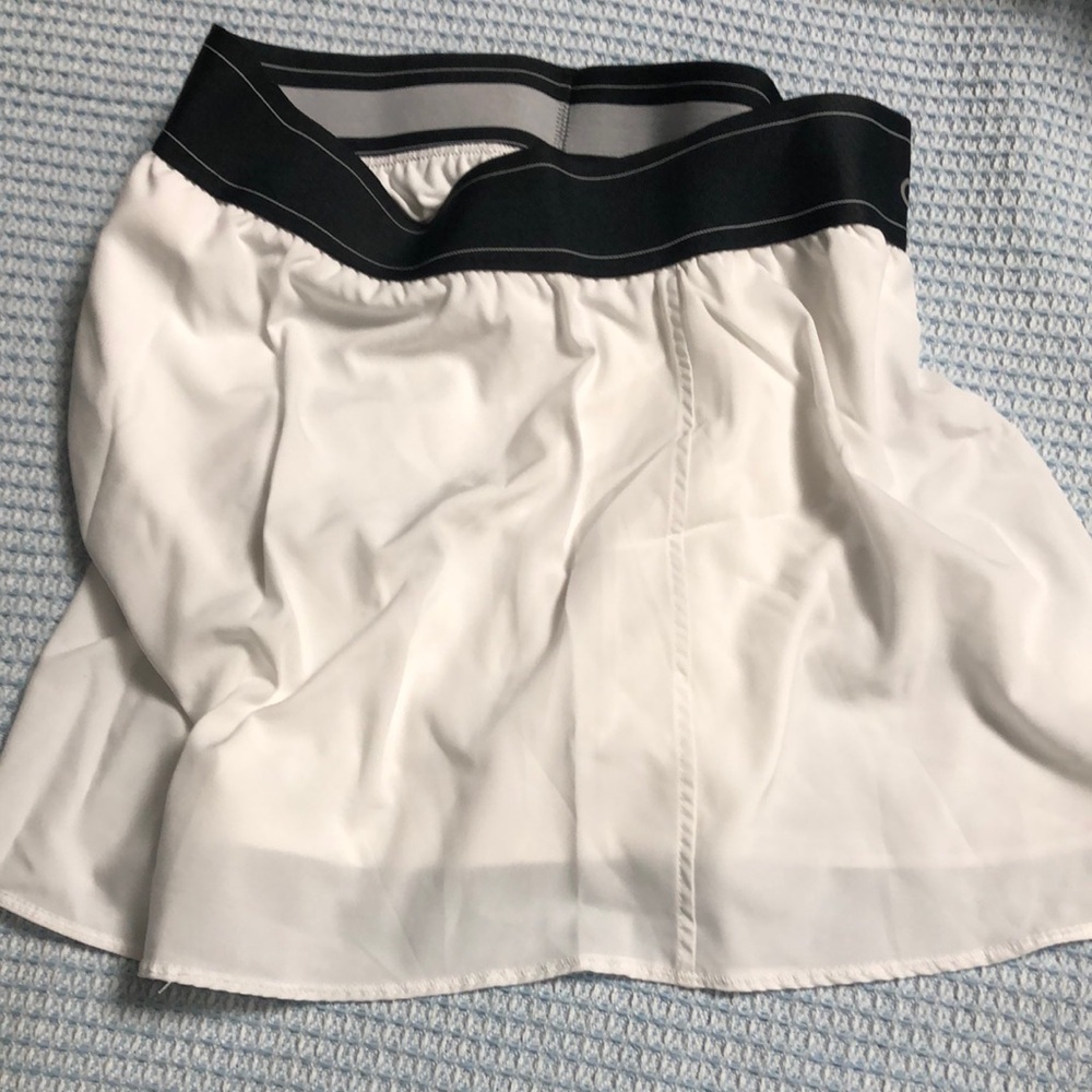 Lulu-B Chic White Mini Skirt with Black Accents